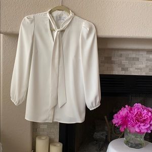 Cartier white bow blouse size 32 euro 0/2 US
